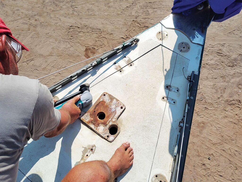 Cutting into a sailboat deck