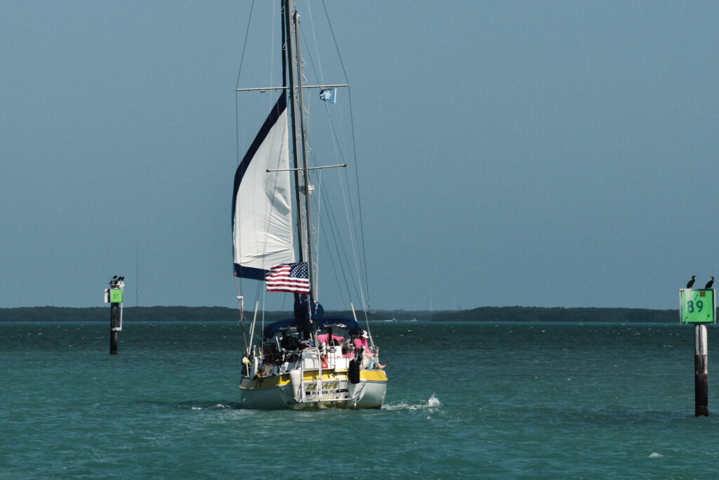 Sailboat on the water from behind