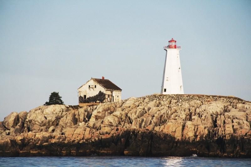 Nova Scotia Lighthouse on rocky coastline near Cape Sable