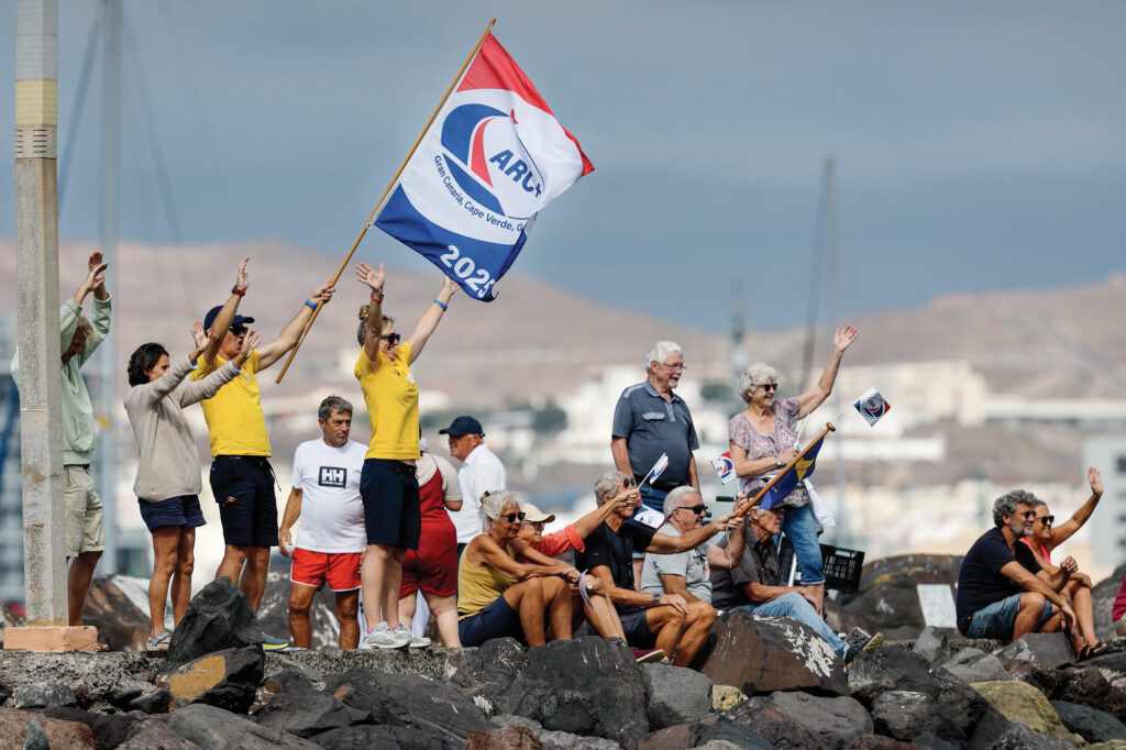 crowd cheers on the fleet