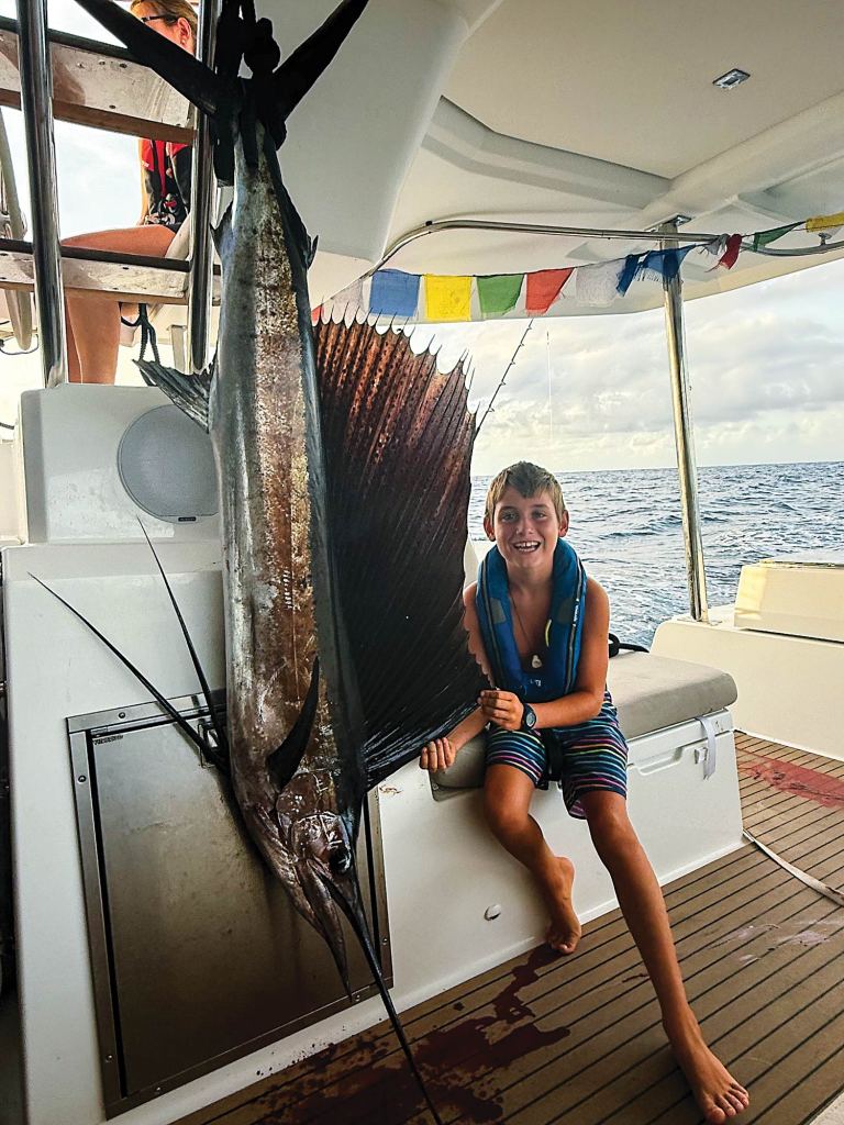 Zack holds his own against a 70-pound sailfish