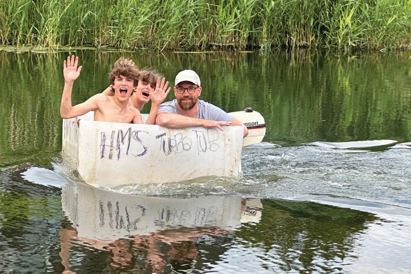 Ian and twins Seb and Xavi aboard HMS Turbo Tub II
