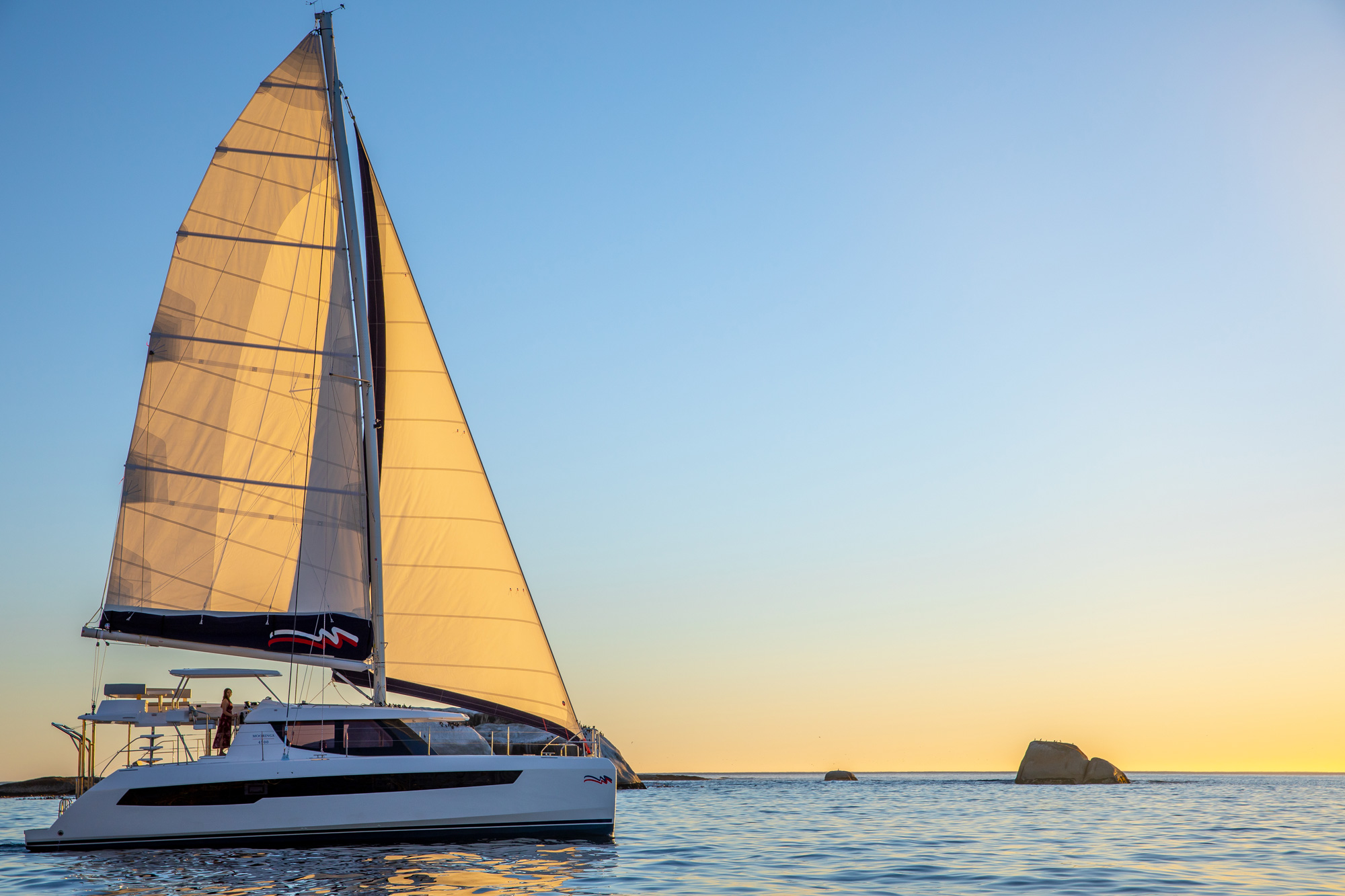 The award-winning Moorings 4500 under sail at sunset.