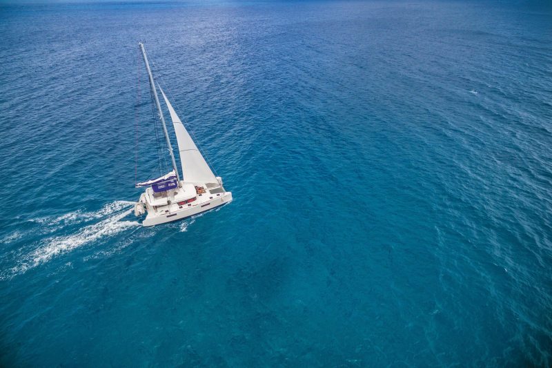 Catamaran sailing in open water
