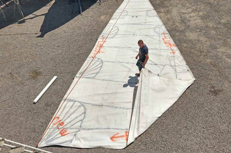 Spray painted sail on ground for instruction