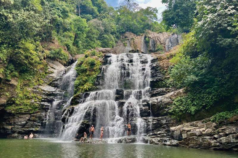 Tourists gather at Nauyaca Waterfall