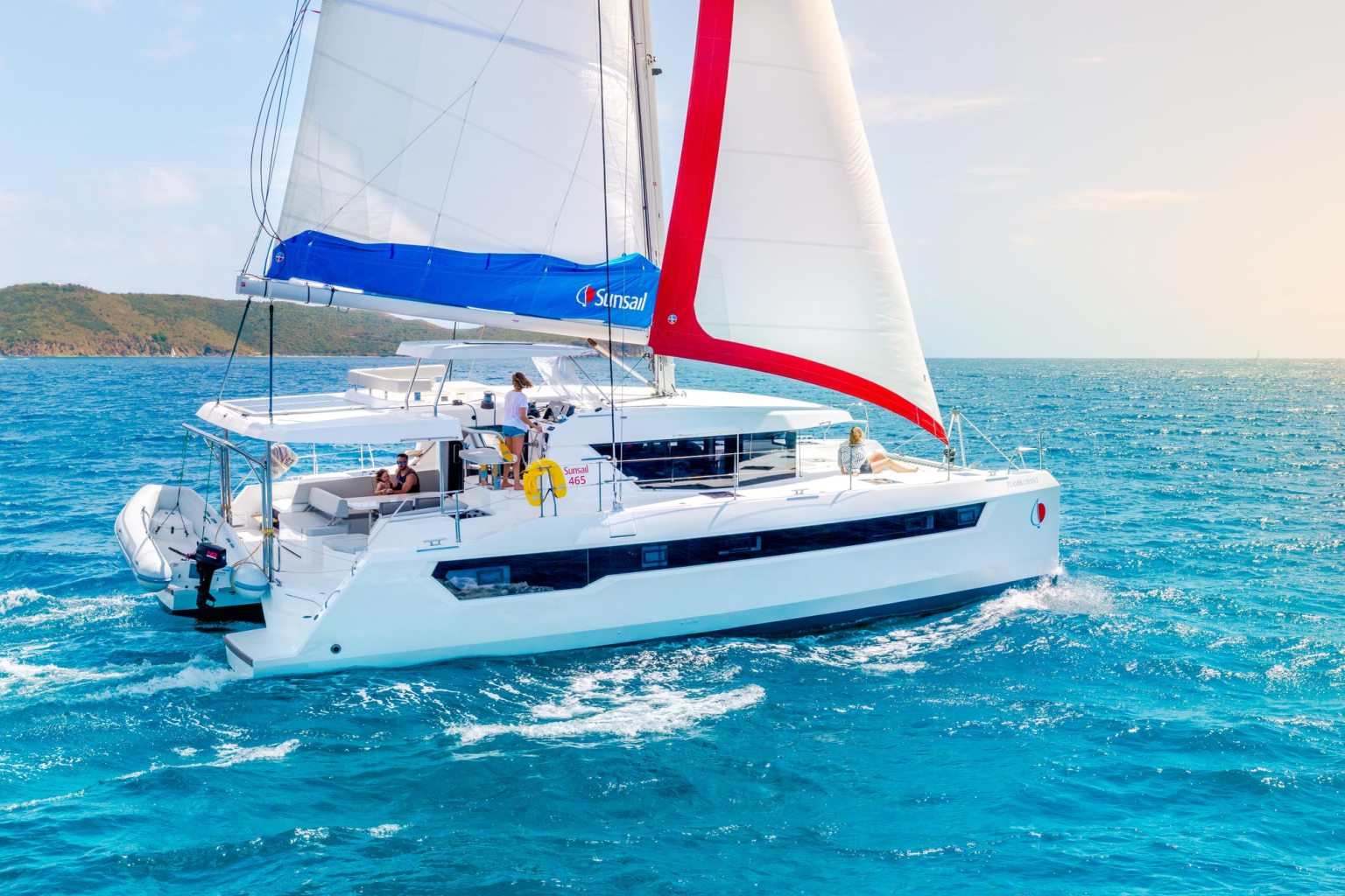 An award-winning Sunsail 465 catamaran at sail in the BVI