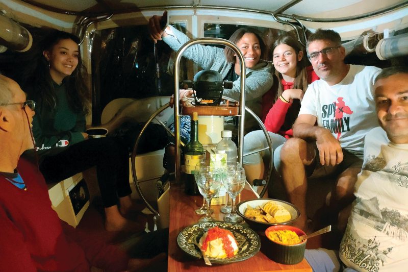 Group of people in a sailboat