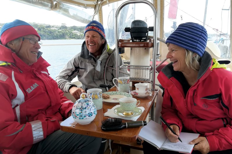 Sailors chatting at a table